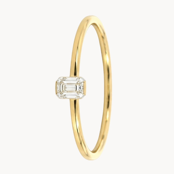 SOLITAIRE RING WITH 0.15-CARAT RADIANT-CUT DIAMOND