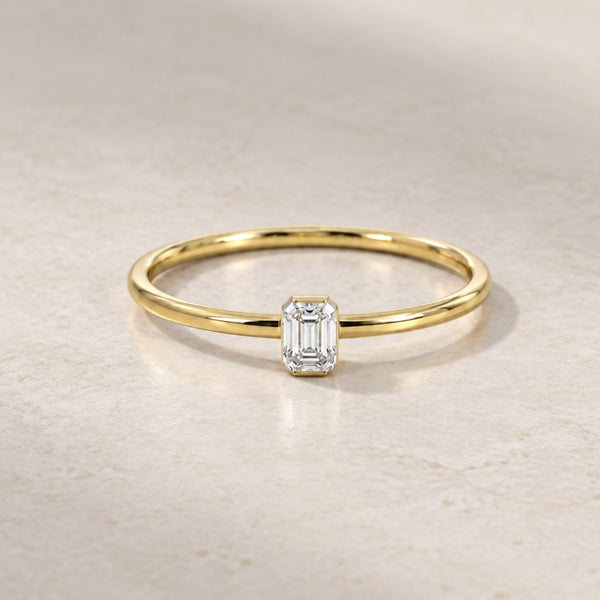 SOLITAIRE RING WITH 0.15-CARAT RADIANT-CUT DIAMOND