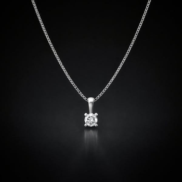 COLGANTE CON DIAMANTE GARRAS 0.10 QUILATES PUNTO DE LUZ