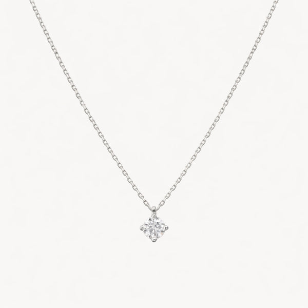 COLGANTE CON DIAMANTE GARRAS ROMBO 0.15 QUILATES PUNTO DE LUZ