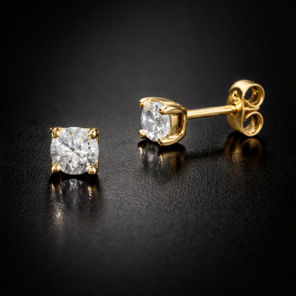 PENDIENTES CON DIAMANTE GARRAS 0.60 QUILATES PUNTO DE LUZ CERTIFICADO IGI