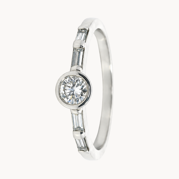 ROUND DIAMOND RING WITH BAGUETTES