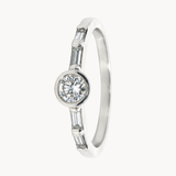 ROUND DIAMOND RING WITH BAGUETTES