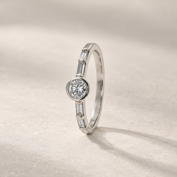 ROUND DIAMOND RING WITH BAGUETTES