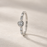 ROUND DIAMOND RING WITH BAGUETTES