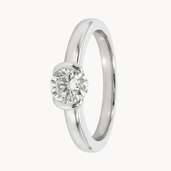 SOLITAIRE RING WITH OPEN HALO