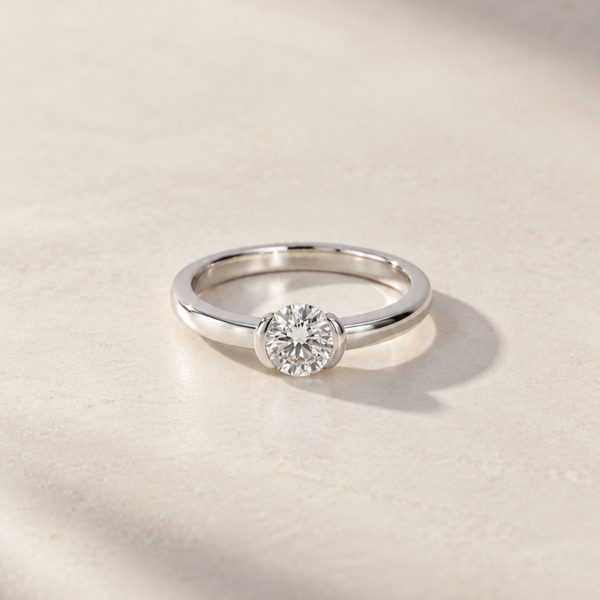 SOLITAIRE RING WITH OPEN HALO