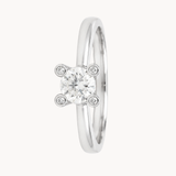 ANILLO DIAMANTE CENTRAL CON LATERALES