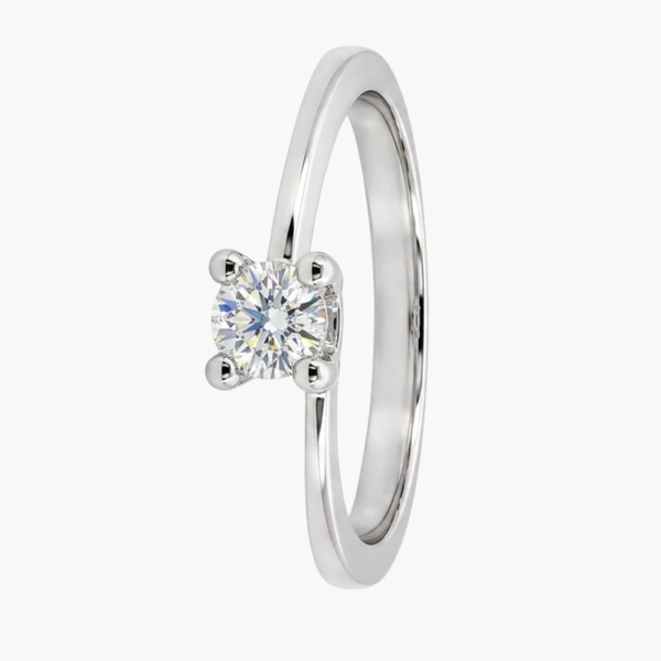 ANILLO SOLITARIO CON BRAZOS ASIMETRICOS