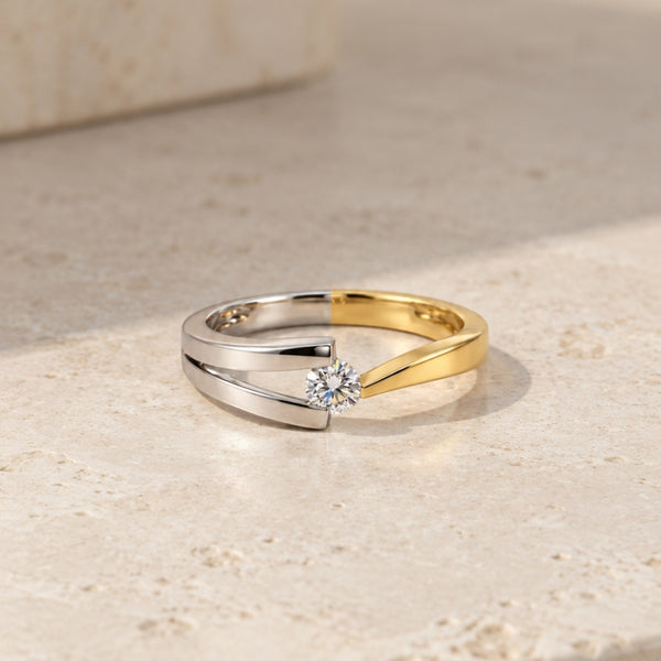 TWO-TONE SOLITAIRE RING WITH BANDS AND FLOATING DIAMOND