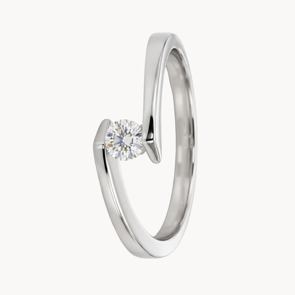 ANILLO SOLITARIO CRUZADO CON DIAMANTE 0.10 QUILATES EN SUSPENSION