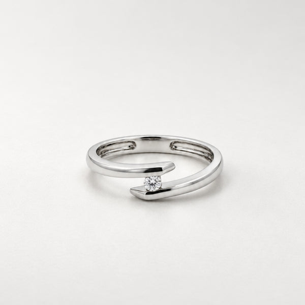 ANILLO SOLITARIO CRUZADO CON DIAMANTE 0.050 QUILATES