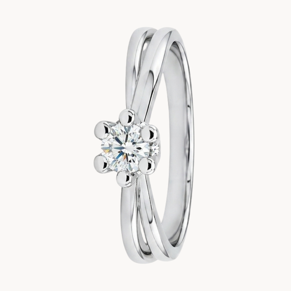 Solitaire ring with intertwined bands