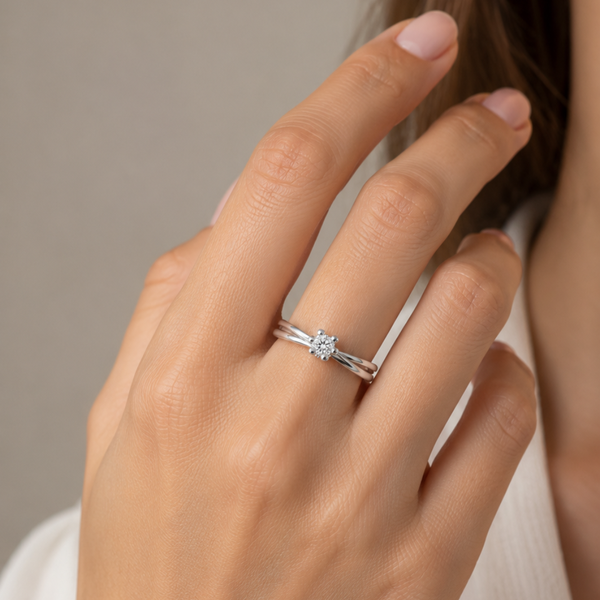 Solitaire ring with intertwined bands