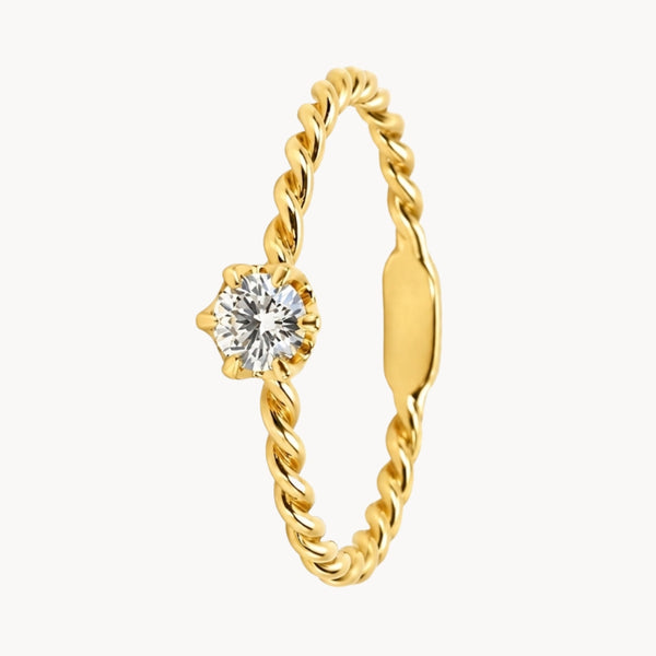 ANILLO SOLITARIO TRENZADO CON DIAMANTE 0.20 QUILATES