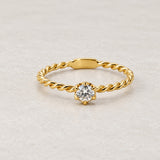 ANILLO SOLITARIO TRENZADO CON DIAMANTE 0.20 QUILATES