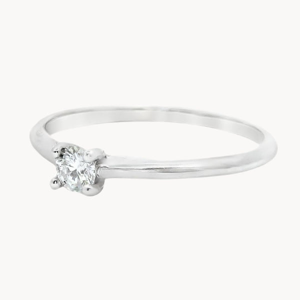 ANILLO SOLITARIO CUATRO GARRAS CON DIAMANTE 0.14 QUILATES GERTIE