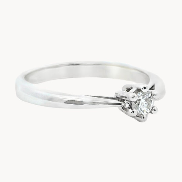 ANILLO SOLITARIO SEIS GARRAS CON DIAMANTE 0.17 QUILATES NELLA