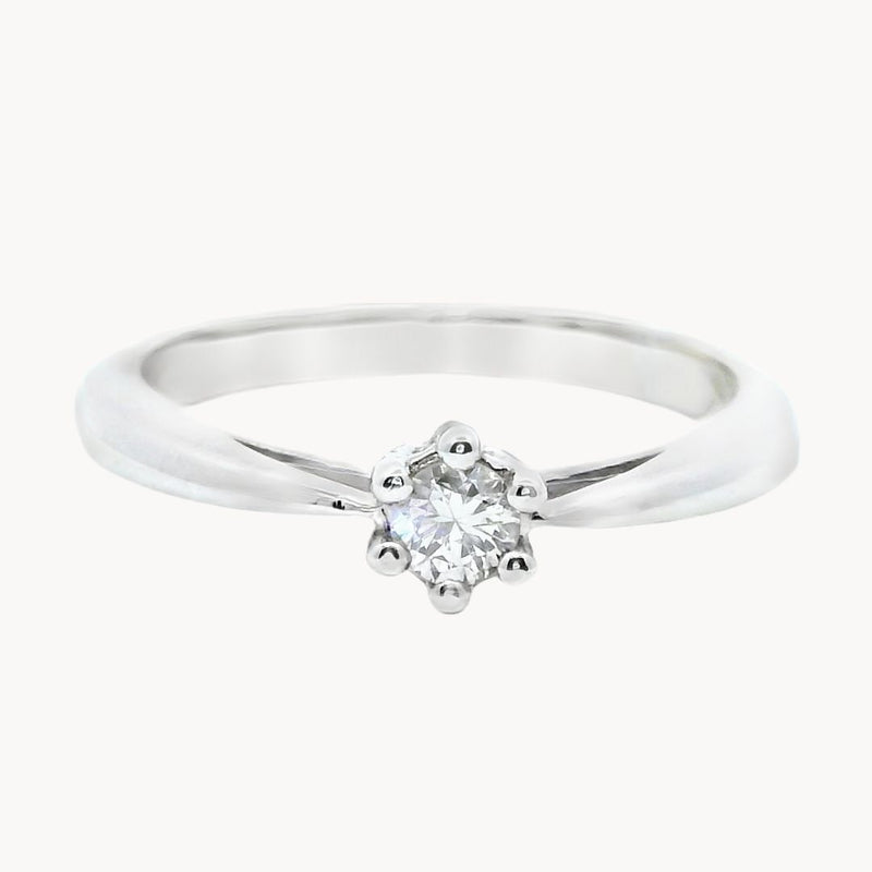 ANILLO SOLITARIO SEIS GARRAS CON DIAMANTE 0.17 QUILATES NELLA