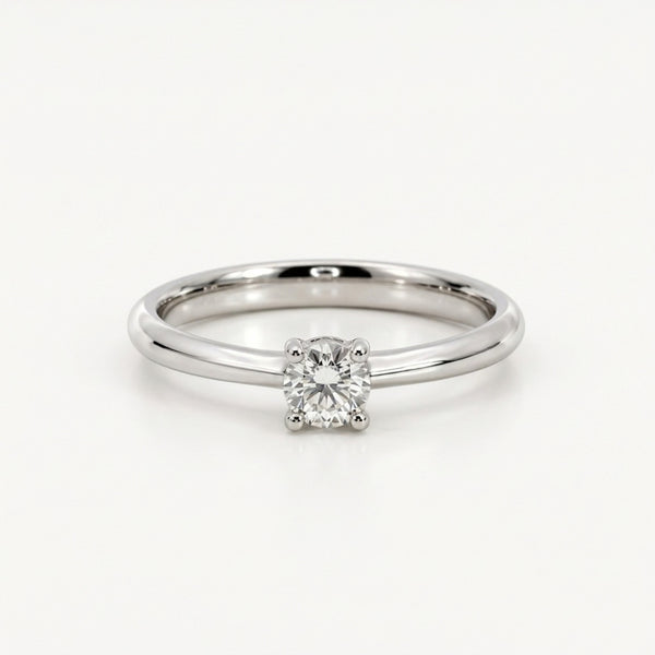 ANILLO SOLITARIO BANDA REDONDA CUATRO GARRAS CON DIAMANTE 0.24 QUILATES