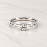 ROUND BAND SOLITAIRE RING WITH FOUR PRONGS AND A 0.24-CARAT DIAMOND