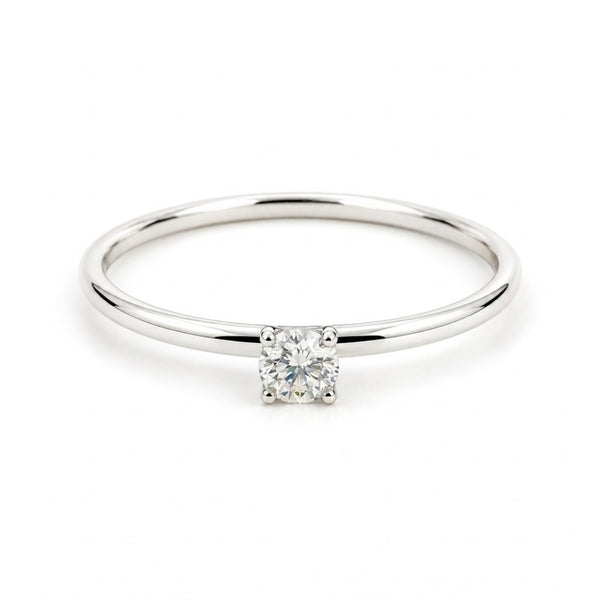 ANILLO SOLITARIO BANDA FINA CUATRO GARRAS CON DIAMANTE 0.14 QUILATES