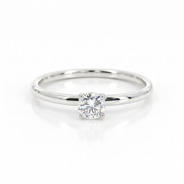 ANILLO SOLITARIO CLASICO CON DIAMANTE ELEVADO 0.23 QUILATES