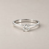 Triangular band solitaire ring with a 0.32-carat diamond