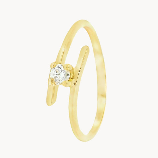 ANILLO SOLITARIO CRUZADO CON DIAMANTE 0.10 QUILATES NOLA