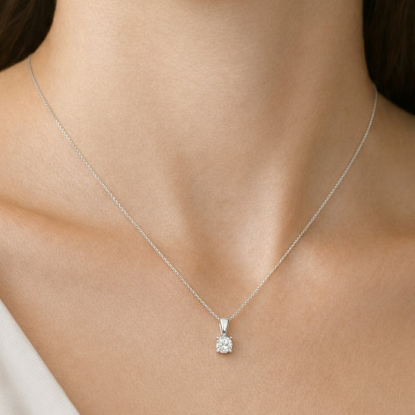 COLGANTE CON DIAMANTE GARRAS 0.30 QUILATES PUNTO DE LUZ CERTIFICADO IGI