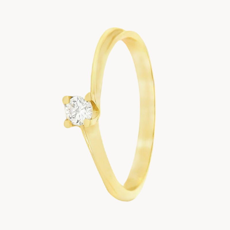 ANILLO SOLITARIO CUATRO GARRAS CON DIAMANTE 0.10 QUILATES LINNIE