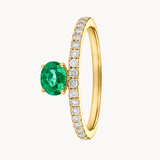 OVAL EMERALD AND DIAMOND RING