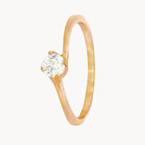 ANILLO SOLITARIO CUATRO GARRAS CRUZADO CON DIAMANTE 0.10 QUILATES AIRI