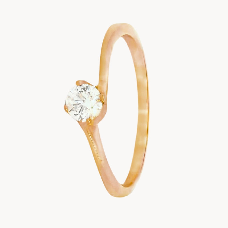 ANILLO SOLITARIO CUATRO GARRAS CRUZADO CON DIAMANTE 0.10 QUILATES AIRI