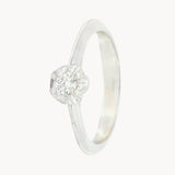 ANILLO SOLITARIO FLOR CON DIAMANTE 0.10 QUILATES GENIE