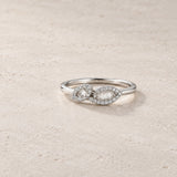 ANEL EM FORMA DE FOLHAS COM DIAMANTES BRILHANTES E BAGUETTE