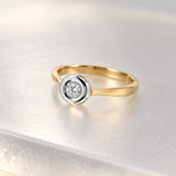 ANILLO SOLITARIO BICOLOR CON DIAMANTE EN CHATON 0.14 QUILATES