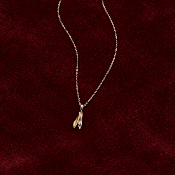 COLGANTE HOJAS BICOLOR CON DIAMANTE NATURAL