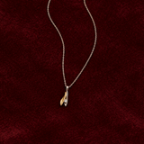 TWO-TONE LEAF PENDANT WITH NATURAL DIAMOND
