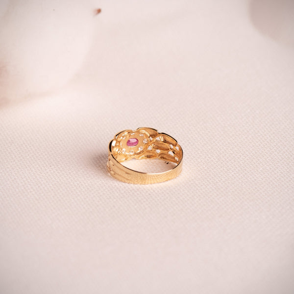 ANILLO PANTER CON RUBI OVAL Y CIRCONITAS