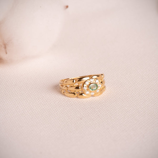 ANILLO PANTER CON ESMERALDA OVAL Y CIRCONITAS