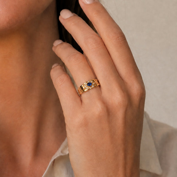 ANILLO PANTER CON ZAFIRO OVAL Y CIRCONITAS