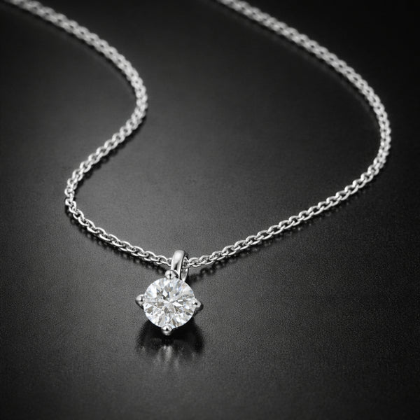 COLGANTE CON DIAMANTE GARRAS ROMBO 0.50 QUILATES PUNTO DE LUZ CERTIFICADO IGI