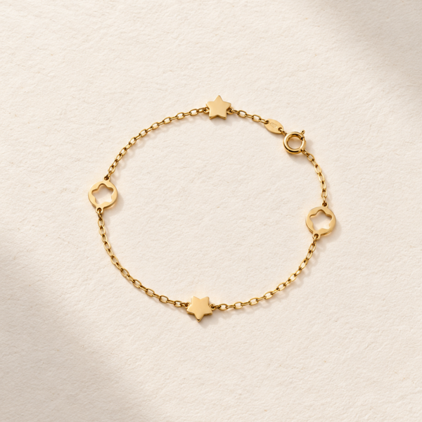 PULSERA ESTRELLAS CON MOTIVOS DE ESTRELLA CALADA