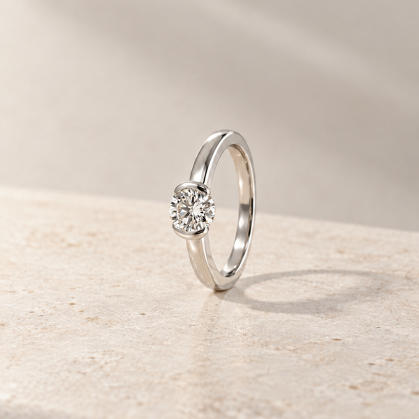 SOLITAIRE RING WITH OPEN HALO