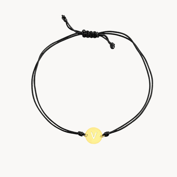 Pulsera Oro 18kt macrame negro e inicial