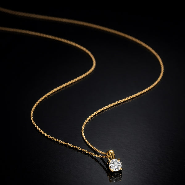 COLGANTE CON DIAMANTE GARRAS 0.050 QUILATES PUNTO DE LUZ