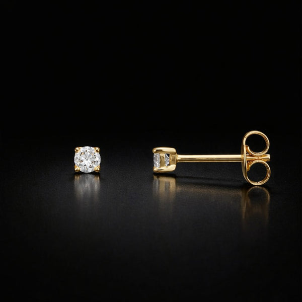 PENDIENTES CON DIAMANTE GARRAS 0.20 QUILATES PUNTO DE LUZ