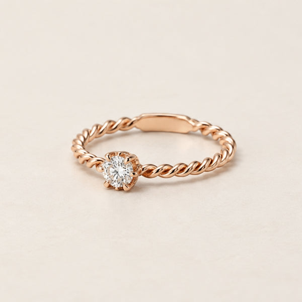 ANILLO SOLITARIO TRENZADO ORO ROSA 0.17 QUILATES