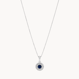 COLGANTE ZAFIRO CON DOBLE ORLA DE DIAMANTES